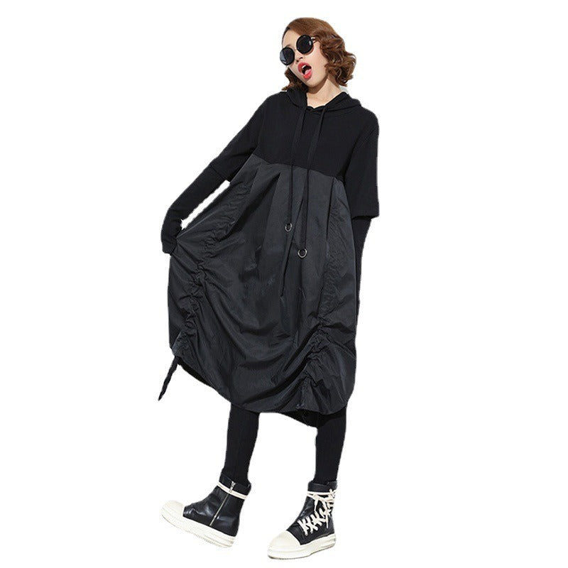 Black pullover hooded dress with female hollow out design long sleeved loose drawstring side slit skirt
