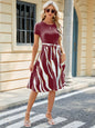 Spring and summer new round neck patchwork printed short sleeved dress with large swing