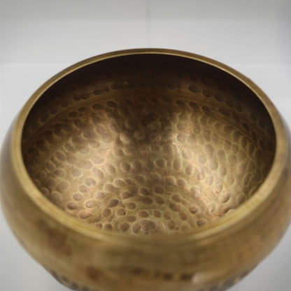 Tibetan brass singing bowl with Sanskrit – handmade meditation instrument for stress relief.