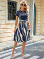 Spring and summer new round neck patchwork printed short sleeved dress with large swing