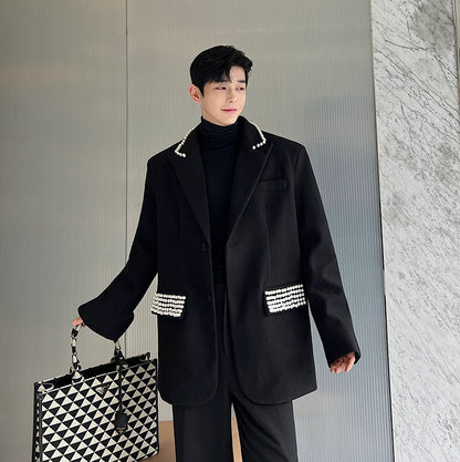 Oversize suit silhouette designed by male and female designers with bead embellishment woolen suit trend single west