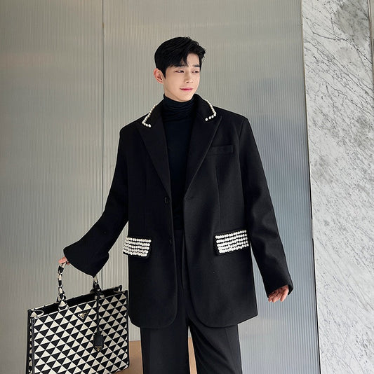 Oversize suit silhouette designed by male and female designers with bead embellishment woolen suit trend single west